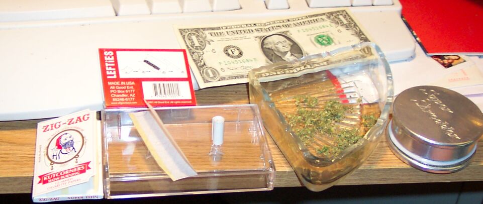 dollar bill to roll a joint